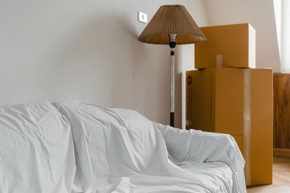 Covered furniture and packed boxes